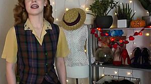 Glamorous redhead achieves intense orgasm using black vibrator