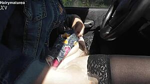 hairy mature in the car flashing her beaver outdoors