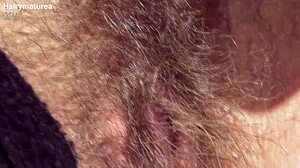 hairy mature in the car flashing her beaver outdoors