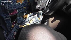 hairy mature in the car flashing her beaver outdoors