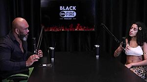 Safada shows off chest tattoos after saying she values small achievements, likes fingering ass, slaps, and blowjobs - Bibi Hourani watch on sheer red.