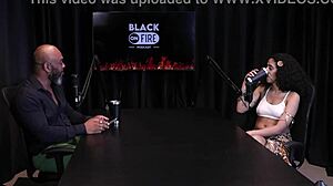 Safada shows off chest tattoos after saying she values small achievements, likes fingering ass, slaps, and blowjobs - Bibi Hourani watch on sheer red.