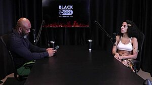 Safada shows off chest tattoos after saying she values small achievements, likes fingering ass, slaps, and blowjobs - Bibi Hourani watch on sheer red.