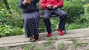 Hot Milf Jerks Big Dick Into Glass On Park Bench