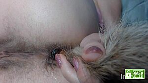 Hairy toy probes ass with fingering and farting