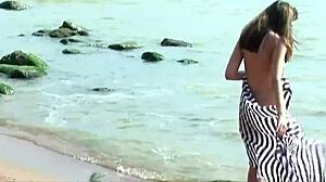 Tanned brat juliette got a lot of fun stripping off at the beach. She fingered her hairy pussy outdoors.