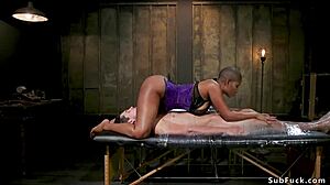 ebony dom anal fucks man in straitjacket