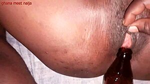 Ebony Ghana Girl Fucks Malt Bottle With Onion Booty