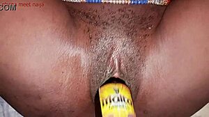 Ebony Ghana Girl Fucks Malt Bottle With Onion Booty