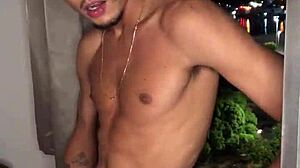 The naughty boy jerks off at the building window