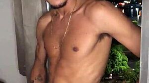 The naughty boy jerks off at the building window