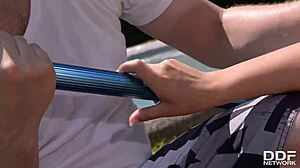 Busty redhead Lola Fauve relaxes by the pool with the pool boy