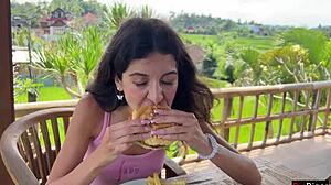 cute girl eating burger with cum on her face in public cafe - cumwalk 😋