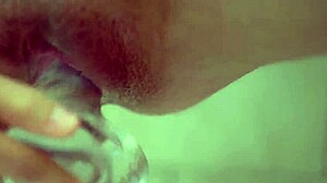 natural busty redhead closeup with clear dildo