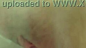 natural busty redhead closeup with clear dildo