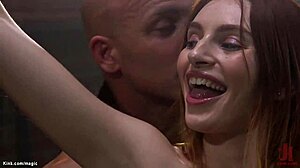 Slim Redhead Feels Intense Pleasure During Anal Fucking in Bondage