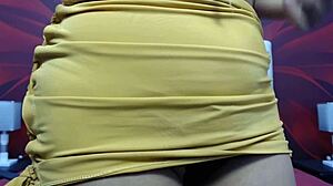 the latina babe bent over in doggystyle on webcam, her big ass shaking