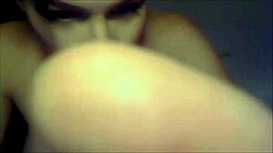 Stunning shemale with short hair poses seductively on webcam