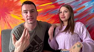 Pretty colombian brunette kisses muscular bodybuilder in college setting