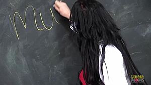 Blindfolded student receives blowjob from brunette milf teacher with big tits before doggy style