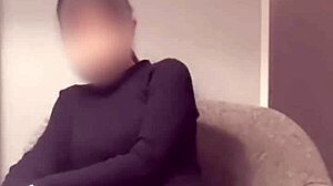 A slender Japanese teen wears red sexy shorts during shooting session