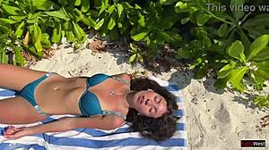 amateur girl gets pissed on by lover on public beach, shocked reaction