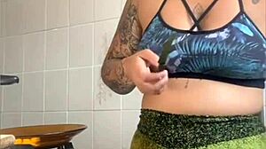 Married woman pretends to cook online but flashes her swollen pussy boldly