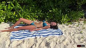 amateur girl gets pissed on by lover on public beach, shocked reaction