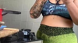Married woman pretends to cook online but flashes her swollen pussy boldly