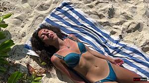 amateur girl gets pissed on by lover on public beach, shocked reaction