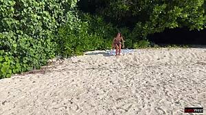 amateur girl gets pissed on by lover on public beach, shocked reaction