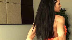 i'm the brunette milf slut penetrating myself with a huge dildo in heels