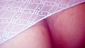 Horny Colombian babe in robe shares her pussy