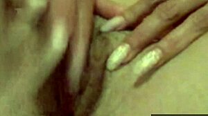 Wife's secret masturbation video shows her fingering her shaved pussy
