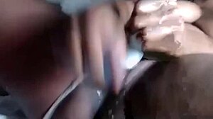 Horny ebony amateur squirts intensely during solo orgasm in bedroom