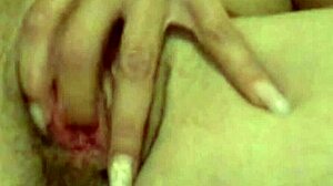 Wife's secret masturbation video shows her fingering her shaved pussy