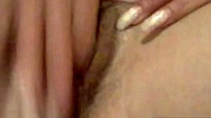 Wife's secret masturbation video shows her fingering her shaved pussy