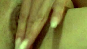 Wife's secret masturbation video shows her fingering her shaved pussy