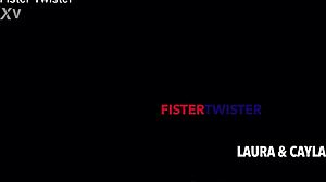 Laura and Cayla engage in intense fisting and dildo play in lesbian session.