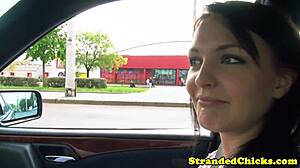 Hitchhiking brunette surprises with a public flash of her chest in outdoor setting