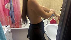 Spying on stepsister with big tits in bathroom