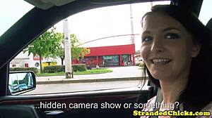 Hitchhiking brunette surprises with a public flash of her chest in outdoor setting