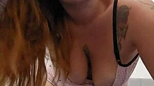 cute redhead shows her tits and pink pussy