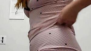 cute redhead shows her tits and pink pussy