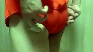 cute swimsuit girl forced to insert oversized anal plug in training