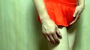 cute swimsuit girl forced to insert oversized anal plug in training