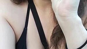 kelly kendricks smokes cigarettes in the sun with lots of cleavage