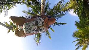 Brunette Bound in Shibari on Coconut Tree for Outdoor Voyeur Thrill