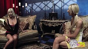 An experienced milf introduces a cute blonde to incredible lesbian action in a dark atmosphere!