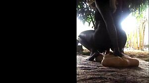 Outside riding a sex toy